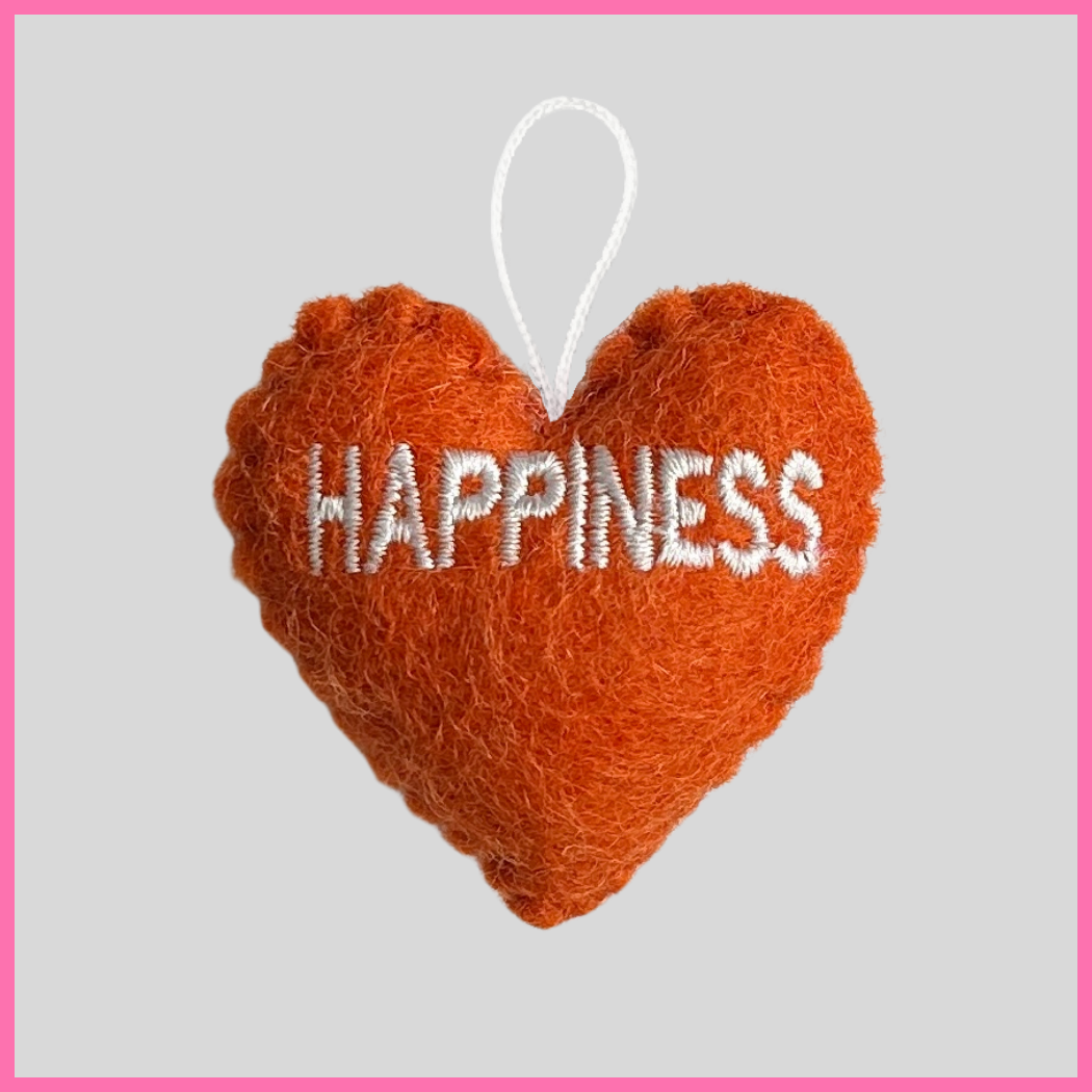 The Happiness Heart is a vibrant orange color! It is the perfect gift to make someone feel happy! You could write a message saying, “You are a bright light in my life, and you bring me so much happiness!” Give the gift that keeps on giving with the Happiness Heart!