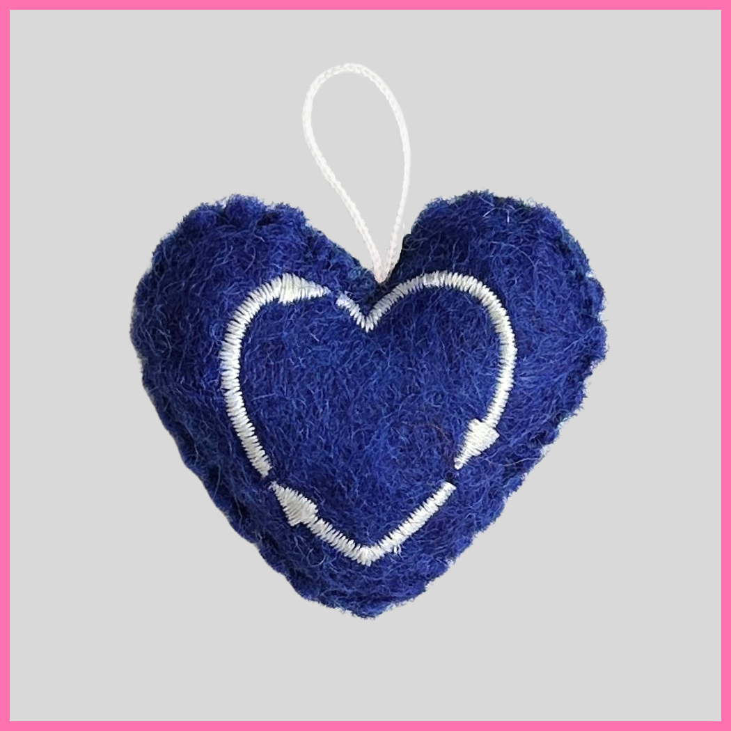 Back of a blue Peace Heart showing The Heart's Intentions heart logo.