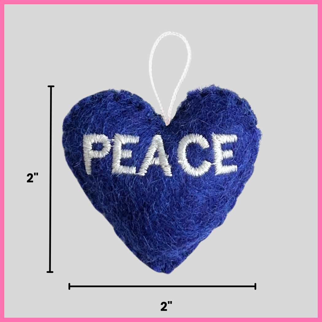 A blue Peace Heart showing its dimensions, two inches by two inches