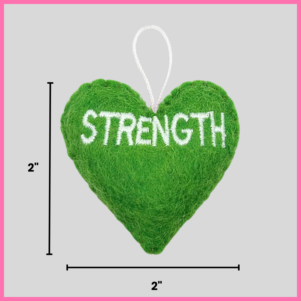 A green Strength Heart showing its dimensions, two inches by two inches.