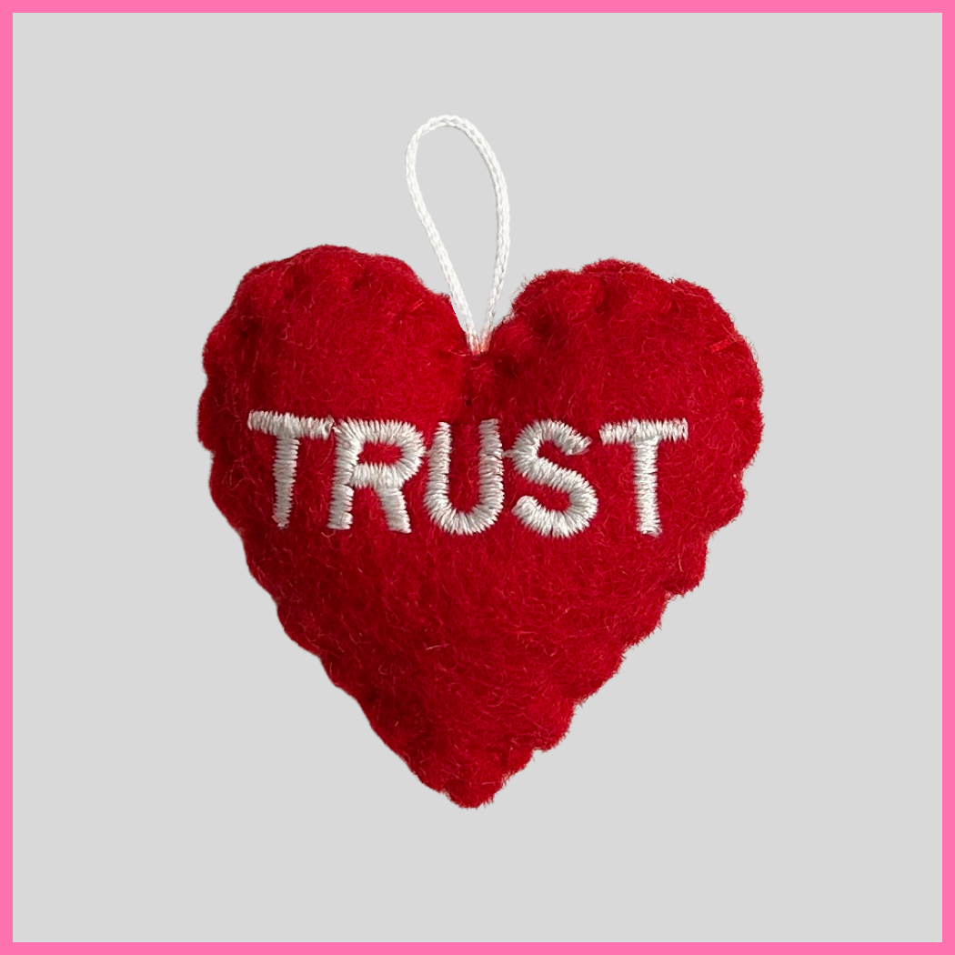 A red Trust Heart with the word TRUST on it, a heartfelt gift to uplift someone and celebrate the bond of friendship. Perfect for sharing a meaningful message like “You are such a good friend, and I trust you with my whole heart.”